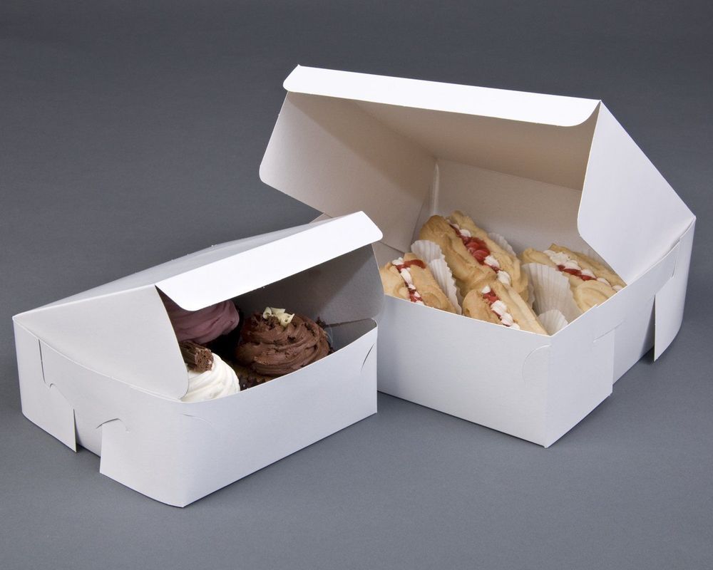 a brand colour, with inner fitments to hold the cakes securely